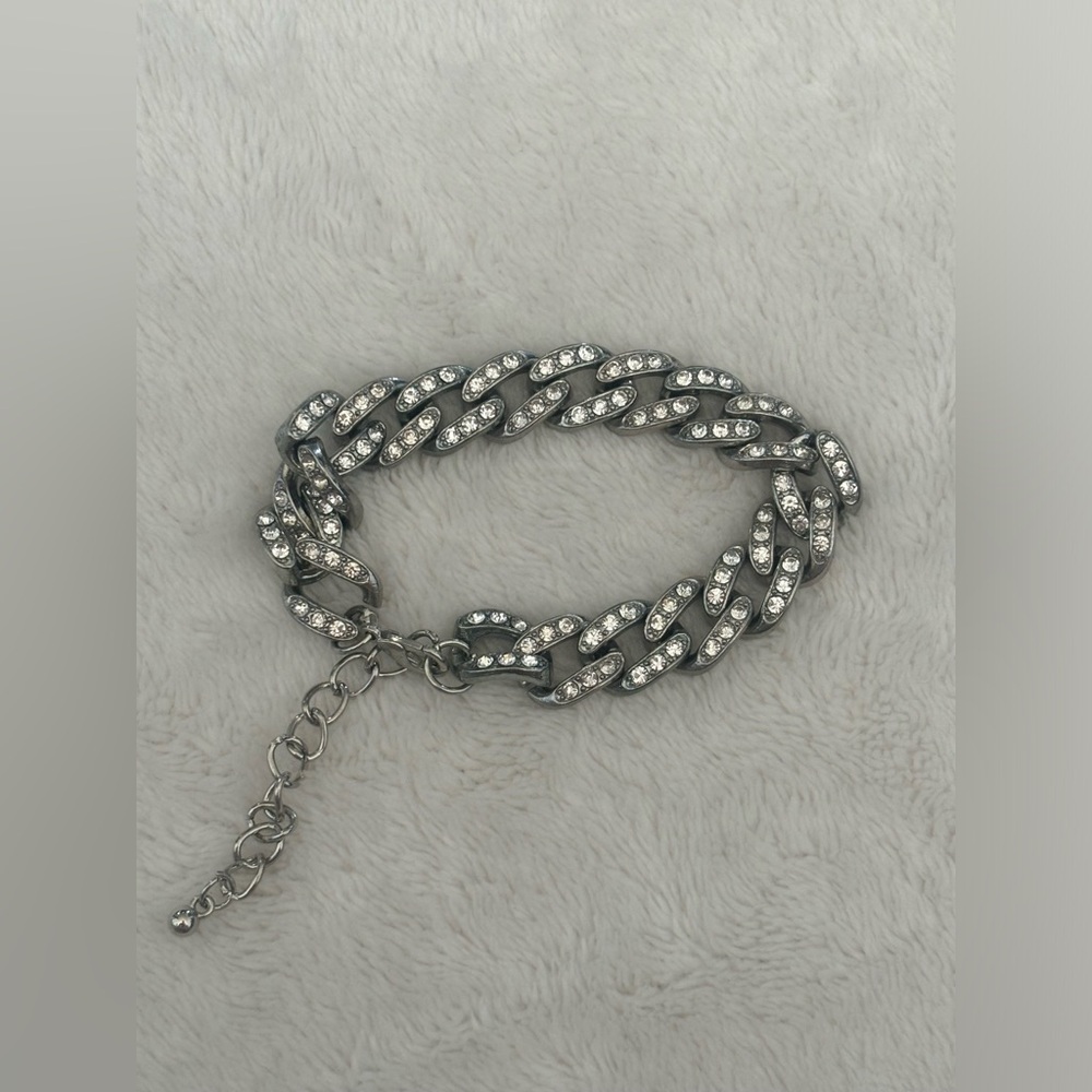 thick, sparkly, silver chain bracelet.